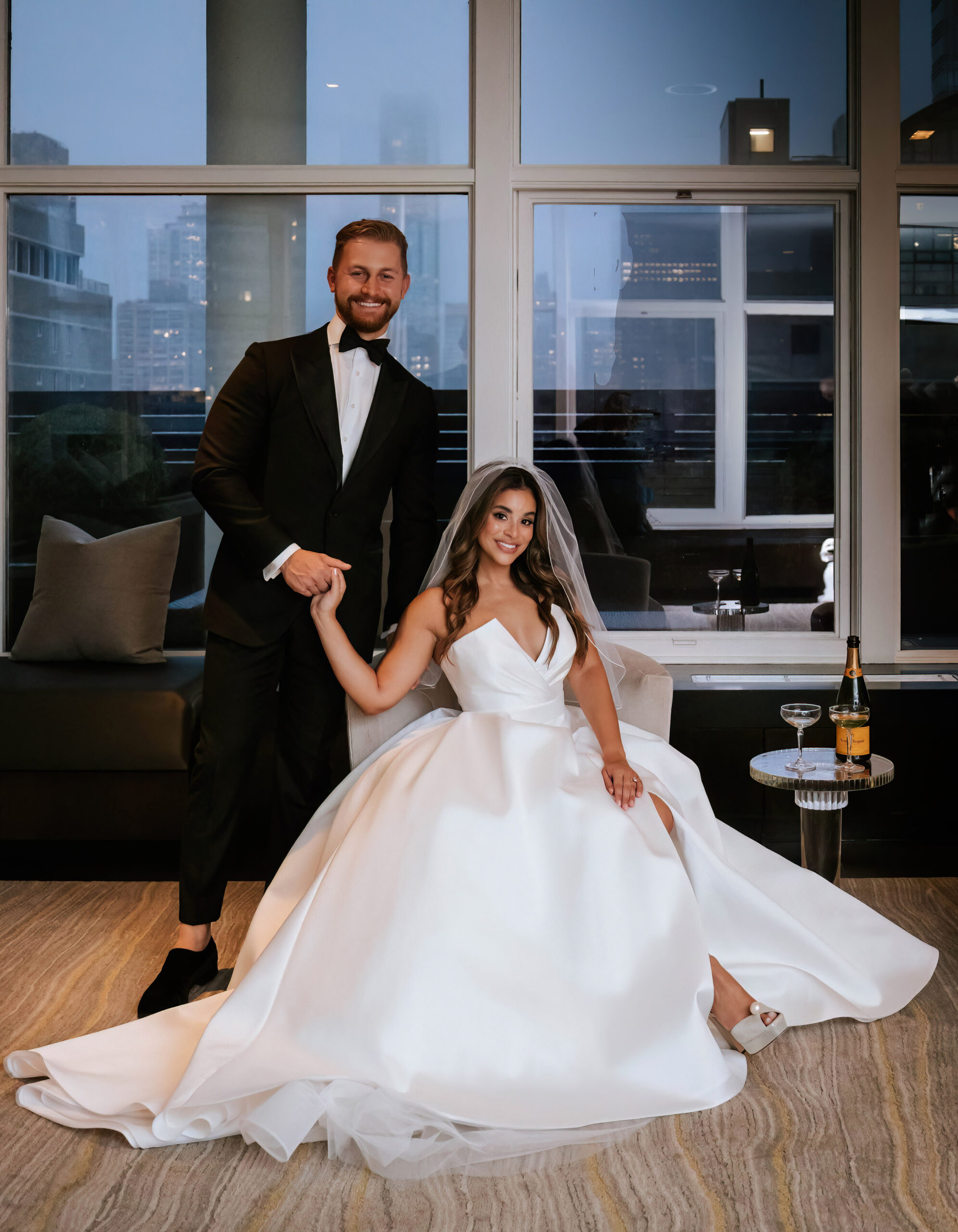 Intimate NYC wedding portrait - bride & groom looking at camera.