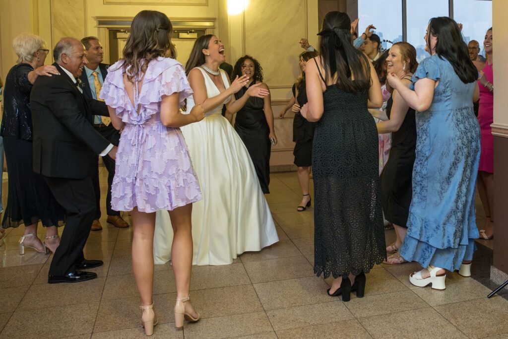 Lisette enjoying the reception party with her guests.